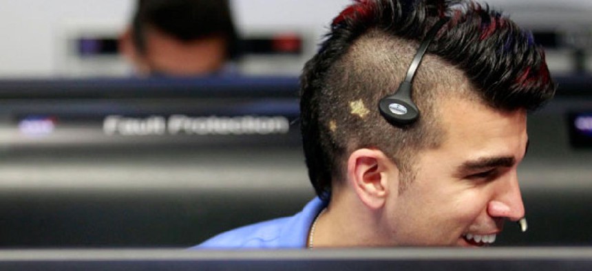 NASA's Bobak Ferdowsi, who cuts his hair differently for each mission, wore a mohawk for Curiosity's landing. 