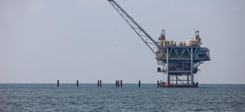 A rig extracts crude oil from the Gulf of Mexico in 2010.