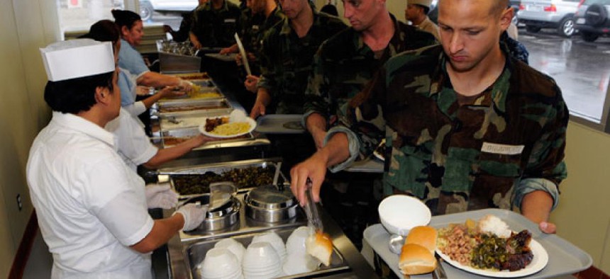 Sailors assigned to Basic Underwater Demolition/SEAL eat lunch on Naval Amphibious Base Coronado in 2010.