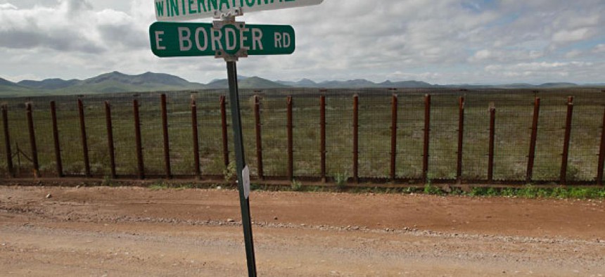 The agents were shot near the border in Nacos, Ariz.