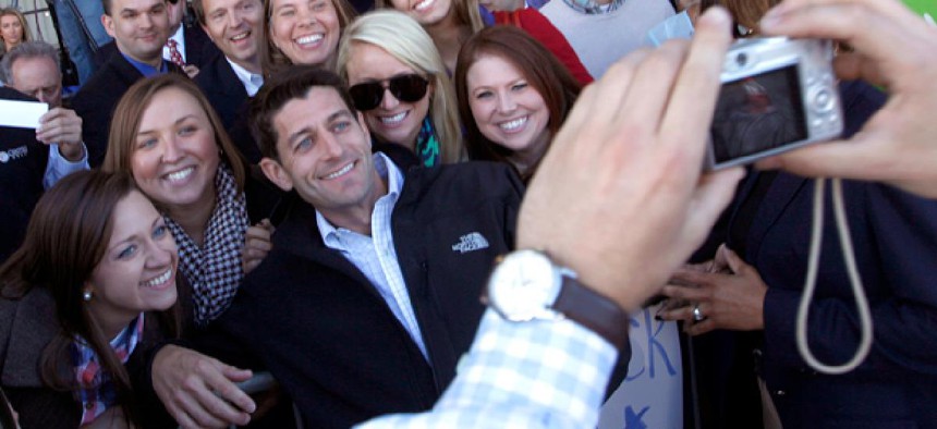 Republican vice presidential candidate, Rep. Paul Ryan, R-Wis., poses for pictures with supporters. 