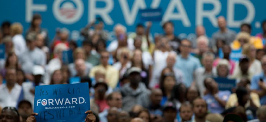 A support holds a sign at an Ohio Obama campaign event earlier in the year.