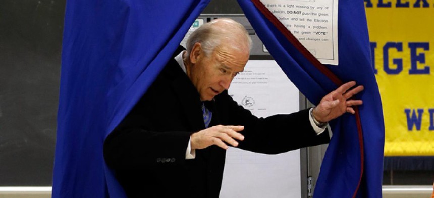 Vice President Joe Biden exits a voting booth after casting his ballot in Greenville, Del.