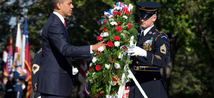Obama laid a wreath at the Tomb of the Unknown Soldier at Arlington Cemetery Sunday.
