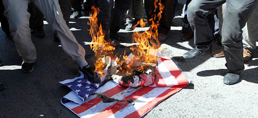A mock U. S. flag set on fire by a group of about 50 angry Islamists, who were shouting anti-U.S. slogans and protesting against a film ridiculing the Prophet Muhammad near the U.S. embassy in Ankara, Turkey.