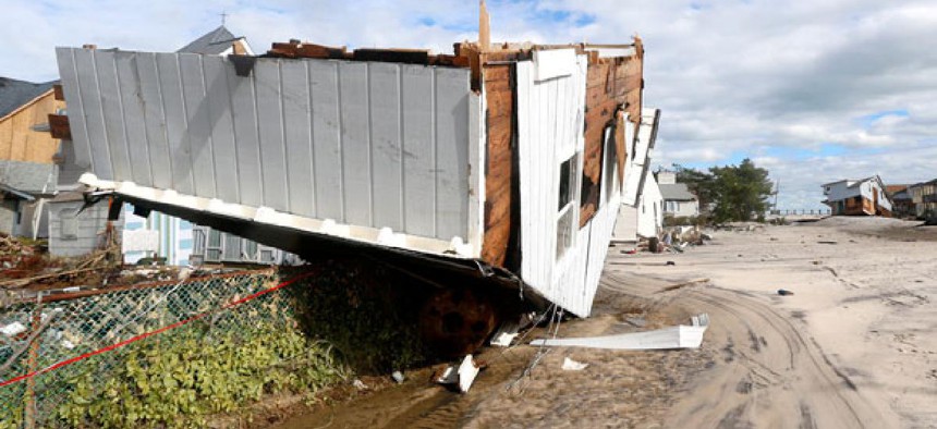 Part of a home rests upside-down in Seaside Heights, N.J. after the storm.