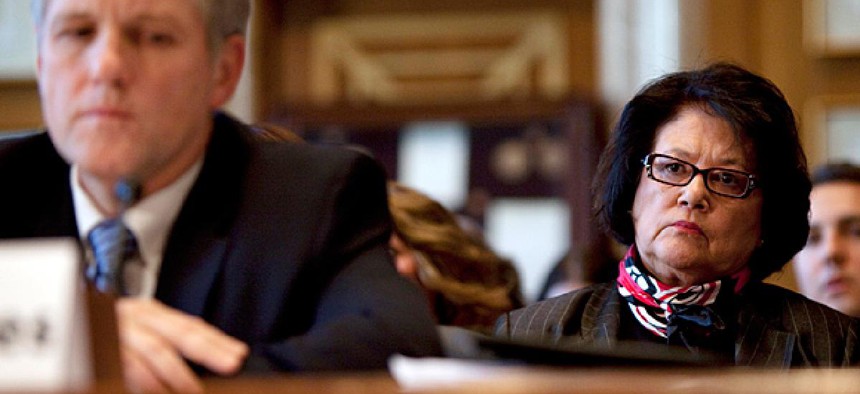 Elouise Cobell, right, looks on as Deputy Secretary of the Interior David Hayes testifies during a Senate Indian Affairs Committee hearing in Washington, D.C. in Dec. 2009.
