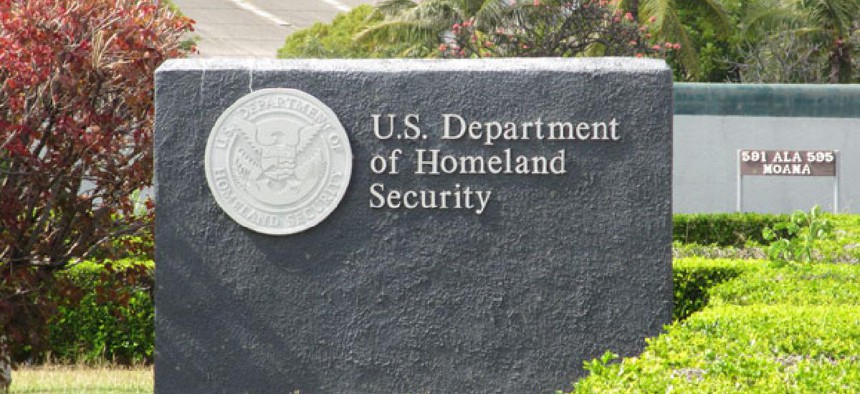 A sign directs visitors to a Homeland Security office in Hawaii.