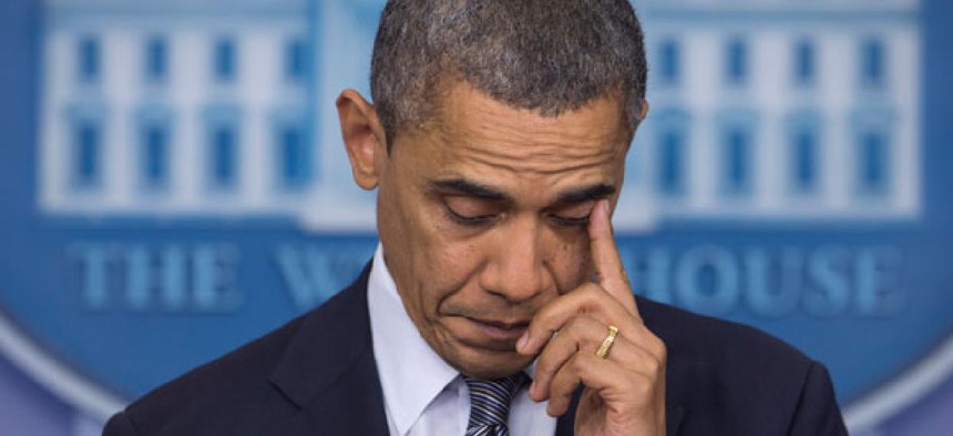Obama wiped away tears before he spoke Friday.