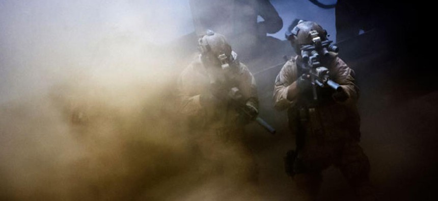 A still from the film shows SEALs during the mission.