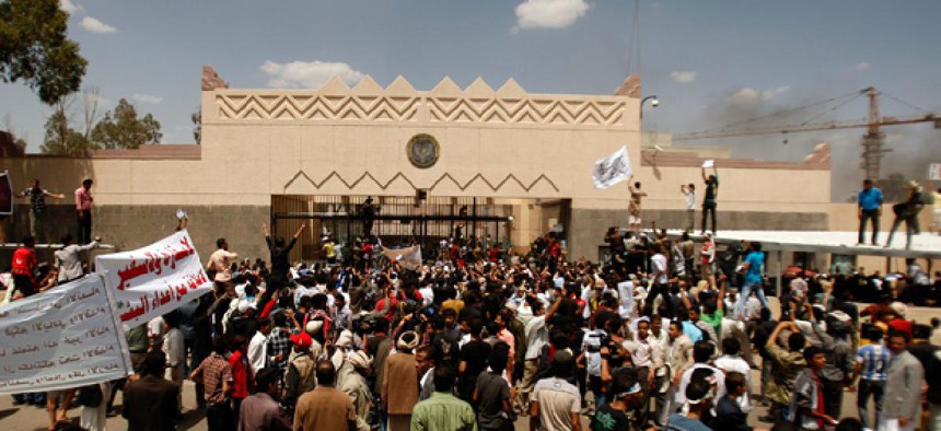 Yemenis protest in front of the U.S. Embassy in Sanaa, Yemen.