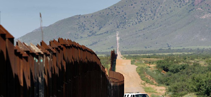 A CBP vehicle patrols the border in Arizona in 2010.