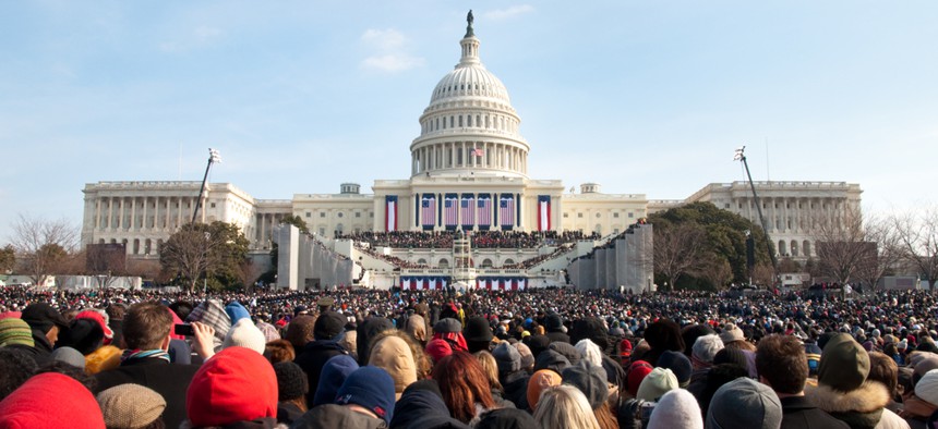 January 20, 2009: A crowd of warmly dressed onlookers attends the 2009 inauguration of President Barack Obama.