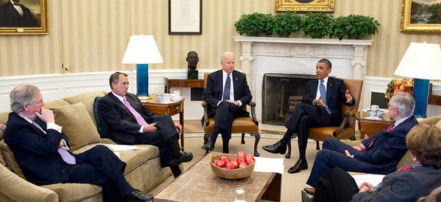 After returning early from his Christmas vacation, the President with the Vice President meets in the Oval Office with the leadership of Congress to discuss the fiscal cliff, Dec. 28, 2012.