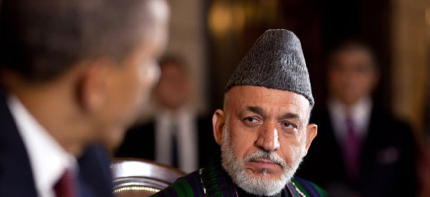 Obama met with Hamid Karzai at the Presidential Palace in Kabul.