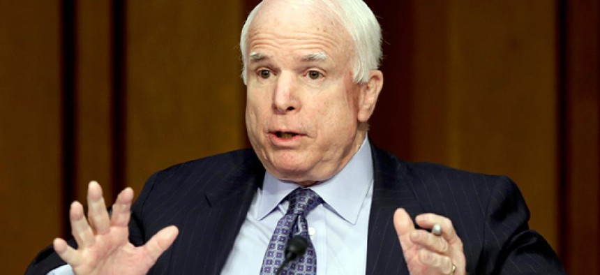 Sen. John McCain, R-Ariz., questions Secretary of State Hillary Clinton on the deadly September attack on the U.S. diplomatic mission in Benghazi.