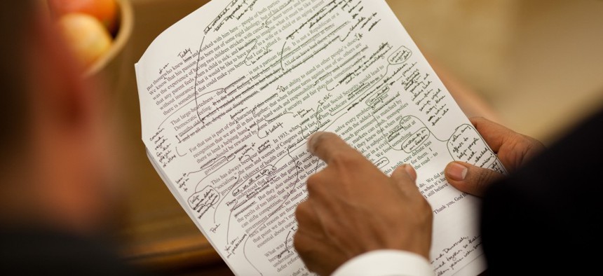 Words, words, words. President Obama reviews a 2009 speech on education.