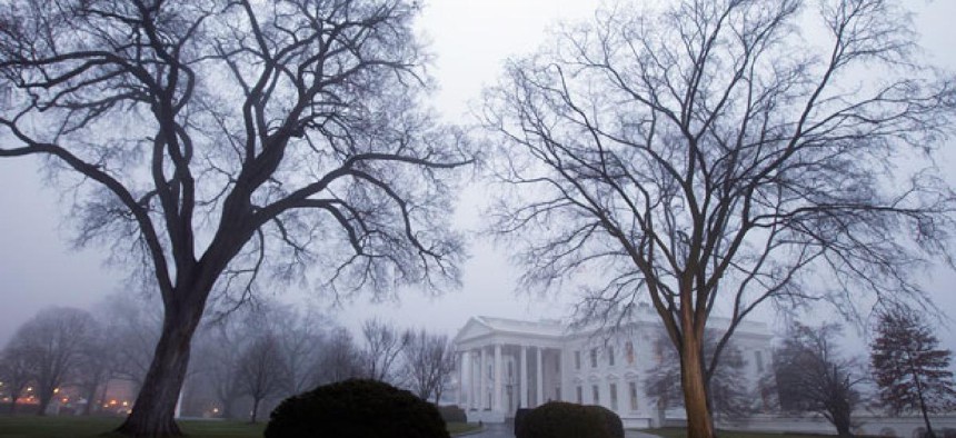 Fog envelopes the White House in December.