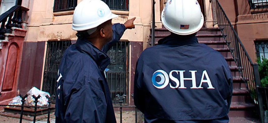 OSHA inspectors work in Brooklyn, New York.