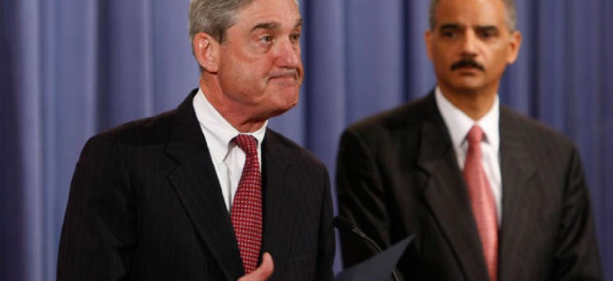 FBI Director Robert Mueller and Attorney General Eric Holder