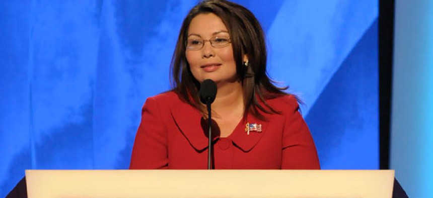 Rep. Tammy Duckworth, D-Ill., said in a statement she will take an 8.4 percent pay cut to match the reduction on most discretionary programs.