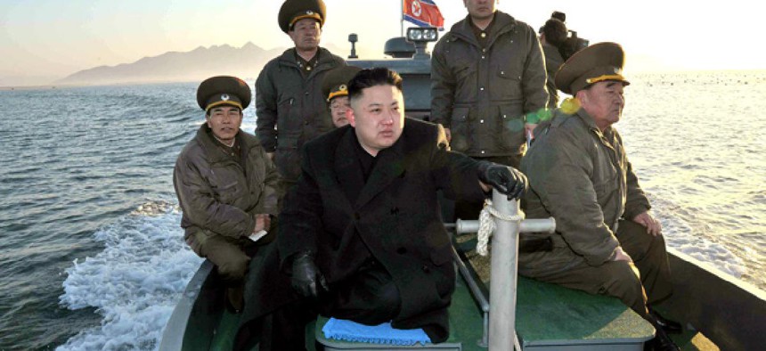 North Korean leader Kim Jong Un rides on a boat.