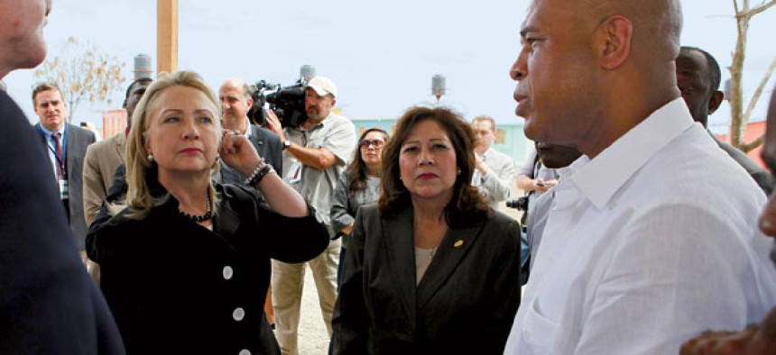 In their former Cabinet roles, Hillary Clinton (left) and Hilda Solis met with Haitian President Michel Martelly.