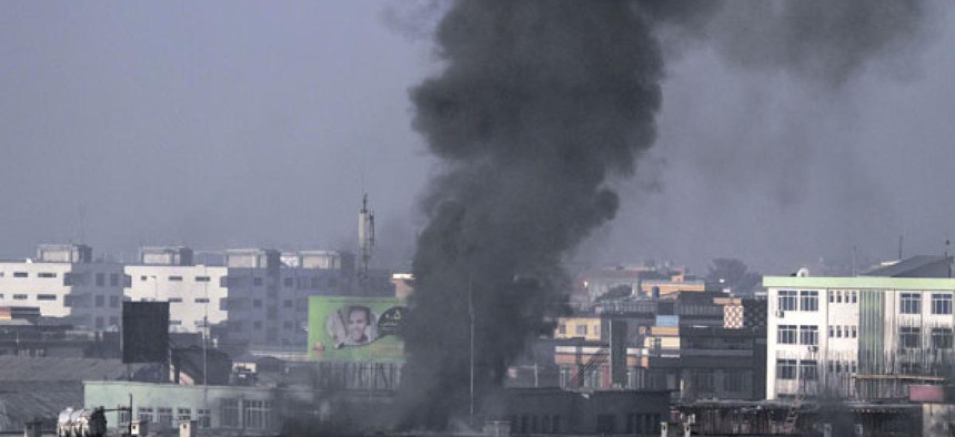 Smoke billows from Kabul traffic police headquarters in January.