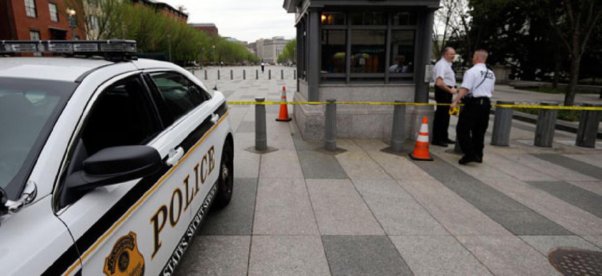 Police tape is used to block off Pennsylvania Ave Monday as the street was closed for security reasons.