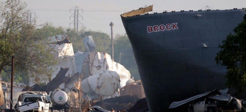 Mangled debris of a fertilizer plant are seen Thursday, April 18, 2013, a day after an explosion leveled the plant in West, Texas.