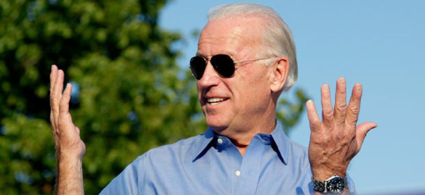 Vice President Joe Biden reacts to a comment by President Obama about his sunglasses.