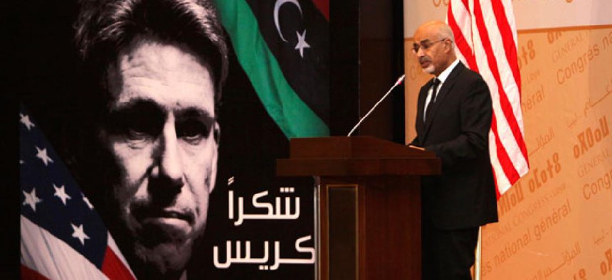 Libyan President Mohammed el-Megarif spoke at the memorial service in Tripoli, Libya, Thursday, Sept. 20, 2012, for U.S. Ambassador to Libya, Chris Stevens.