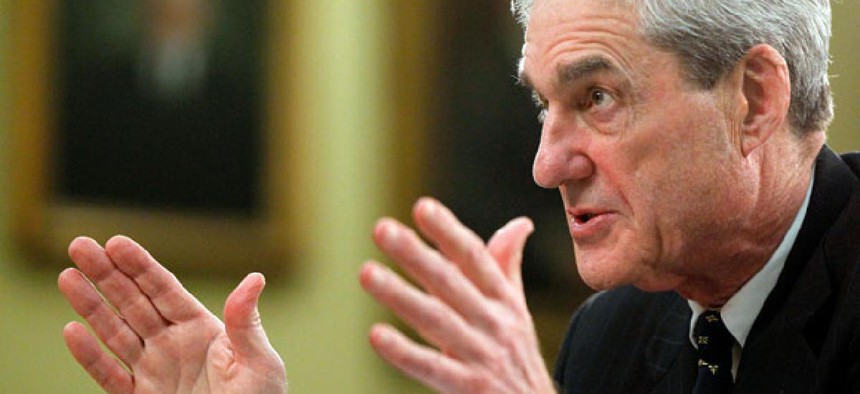 FBI Director Robert Mueller testifies on Capitol Hill in Washington, Tuesday, March 19, 2013.