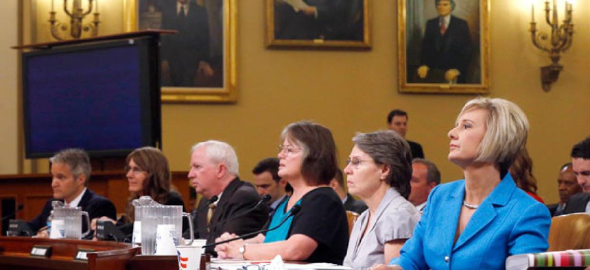 Representatives of organizations that say they were unfairly targeted by the Internal Revenue Service while seeking tax-exempt status, prepare to testify on Capitol Hill on June 4, 2013. 