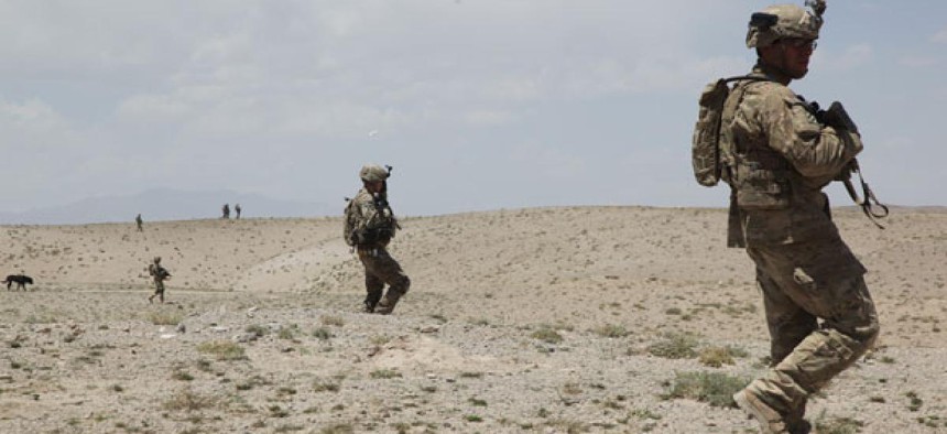 Soldiers conduct a patrol in Ghazni province in 2012.