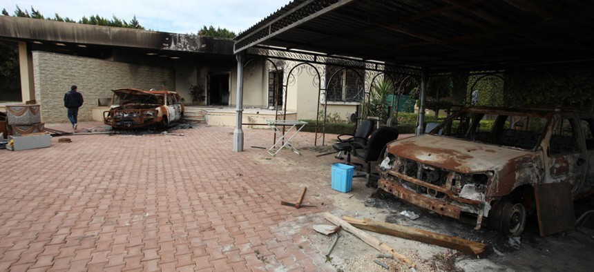Charred vehicles occupy the remains of the U.S. Consulate in Benghazi in September.
