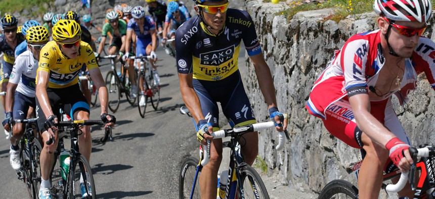 Cyclists compete in the 2013 Tour de France in July.