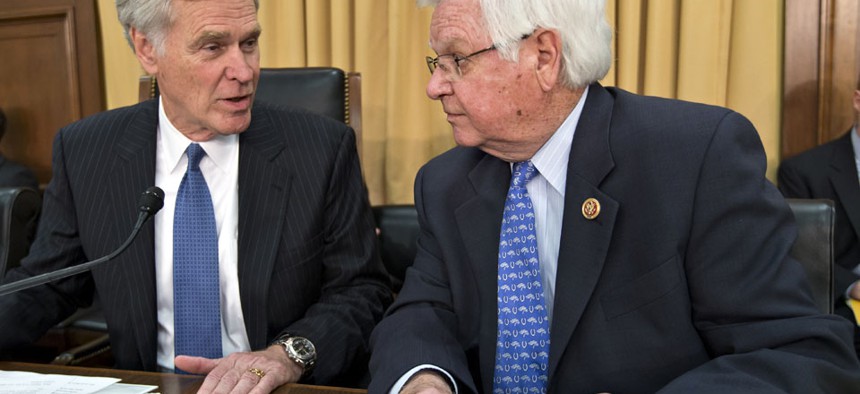 House Appropriations Committee Chairman Rep. Hal Rogers, R-Ky., right, talks with House Financial Services and General Government subcommittee Chairman Rep. Ander Crenshaw, R-Fla. during a hearing investigating the IRS. 