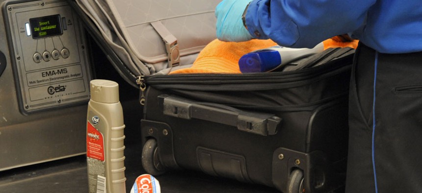 A TSA screener searched a bag in Atlanta in 2011.