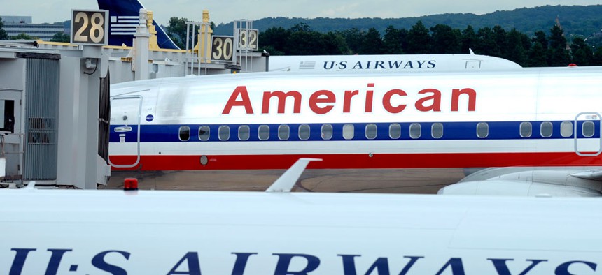 An American Airlines plane is seen between two US Airways planes at Washington's Ronald Reagan National Airport.