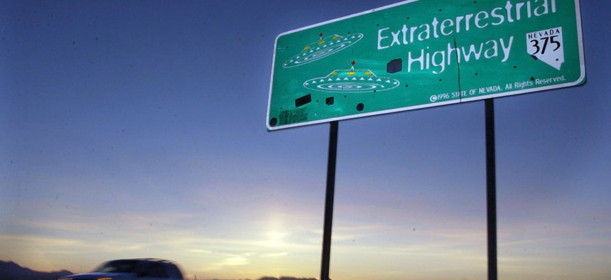 A car moves along the Extraterrestrial Highway near Rachel, Nevada, which runs along the eastern border of Area 51.