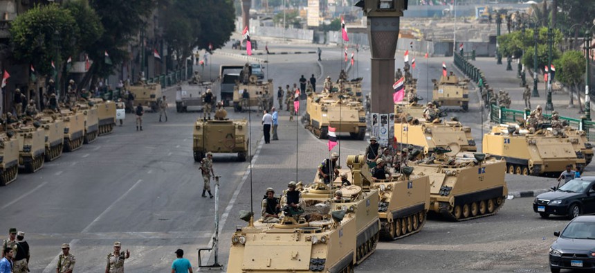 Armored vehicles gather in Cairo's Tahrir Square last week.