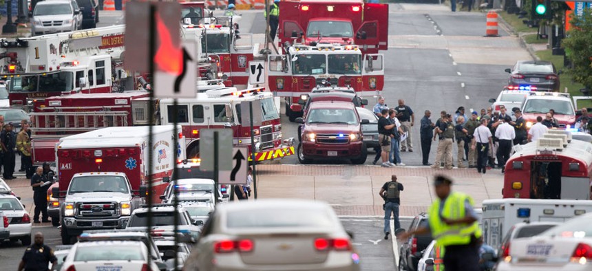 Emergency personnel respond to a reported shooting at the Washington Navy Yard.