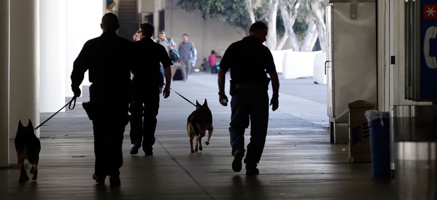 Police check the area around Terminal 1 at Los Angeles International Airport Friday.