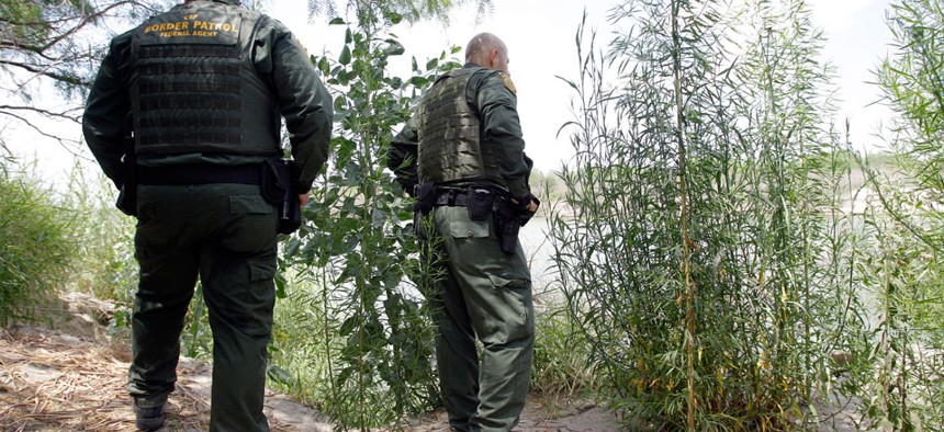 U.S. Customs and Border Patrol agents patrols along the Rio Grande in 2009.