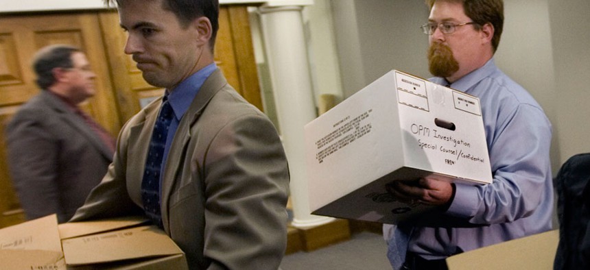 FBI agents removed boxes from the Office of the Special Counsel Scott Bloch in downtown Washington after a subpoena search of Bloch's office in 2008.