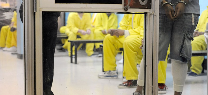 Detainees wait in a waiting room at a medical unit at Baltimore City Detention Center in Baltimore.