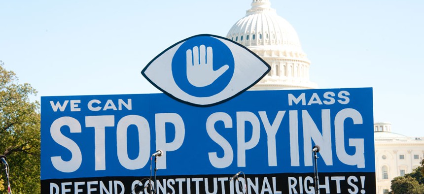 A sign is seen at a protest against the NSA in Washington in 2013.