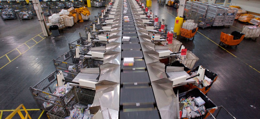 Parcels are automatically sorted at the United States Postal Service Leslie N. Shaw Sr. Processing and Distribution Center in Los Angeles.