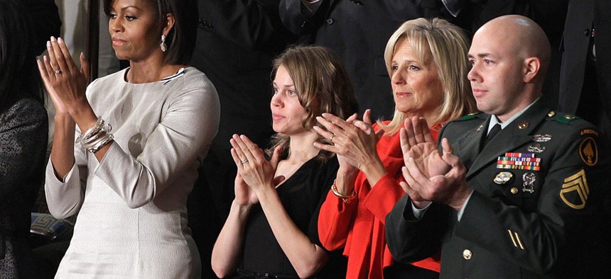 Michelle Obama sat with Brianna Mast, Jill Biden ad Staff Sgt. Brian Mast during President Barack Obama's 2011 State of the Union 